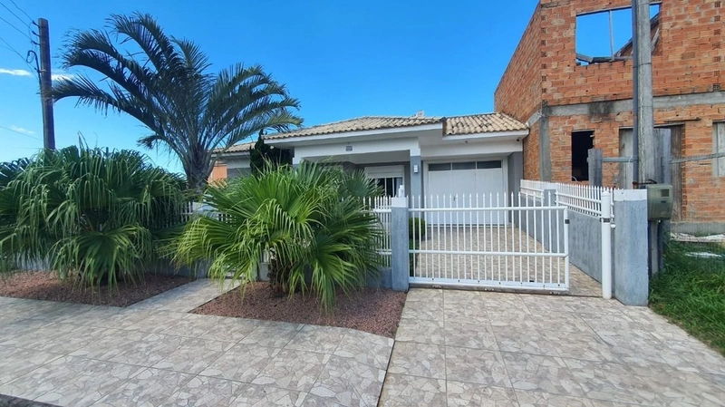 CASA DE TRÊS DORMITÓRIOS EM CAPÃO DA CANOA: 2ª foto da galeria de imagens do imóvel