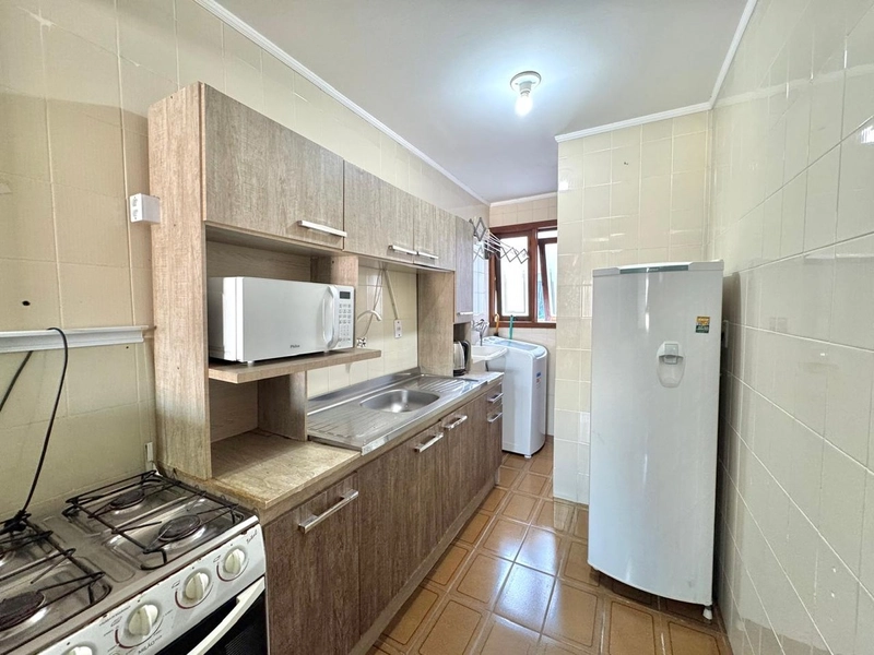 APARTAMENTO EM CAPÃO DA CANOA: 3ª foto da galeria de imagens do imóvel