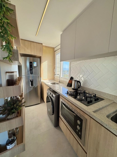 APARTAMENTO COM LINDA DECORAÇÃO EM CAPÃO DA CANOA: 3ª foto da galeria de imagens do imóvel