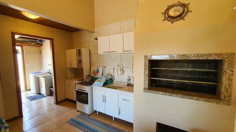 LINDA CASA PROXIMA DO MAR EM CAPÃO DA CANOA: 22ª foto da galeria de imagens do imóvel