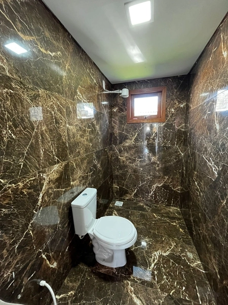 Casa com 3 dormitórios no centro de Xangri-lá: 6ª foto da galeria de imagens do imóvel