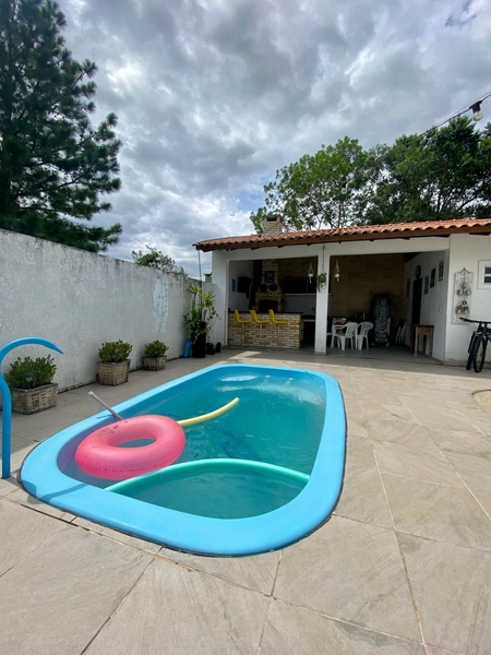 Excelente casa térrea com piscina no bairro Serramar: 2ª foto da galeria de imagens do imóvel