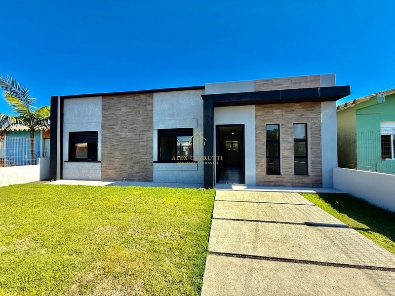 Linda casa na praia de Atlântida Sul: 2ª foto da galeria de imagens do imóvel