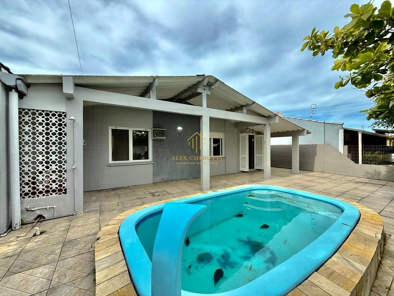Casa na praia de Atlântida Sul: 1ª foto da galeria de imagens do imóvel