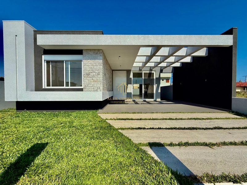 Excelente casa em Atlântida Sul: 2ª foto da galeria de imagens do imóvel