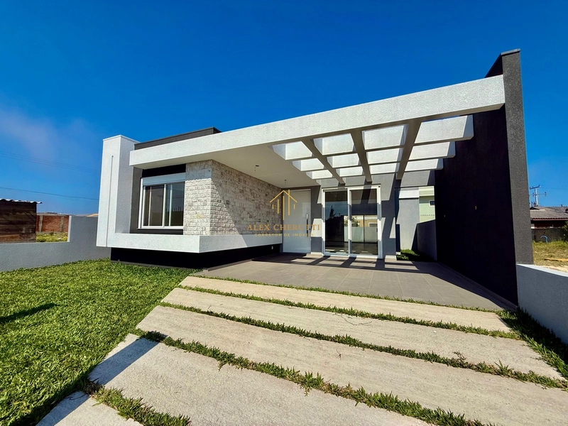 Excelente casa em Atlântida Sul: 3ª foto da galeria de imagens do imóvel