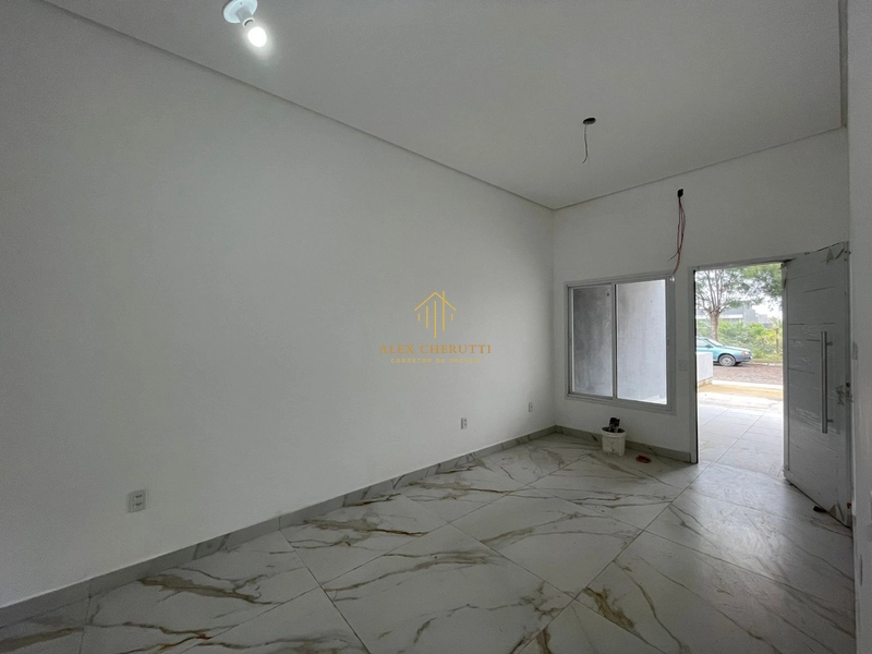 Casa nova geminada em Atlântida Sul: 3ª foto da galeria de imagens do imóvel