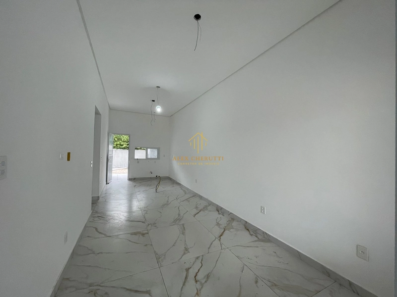 Casa nova geminada em Atlântida Sul: 4ª foto da galeria de imagens do imóvel