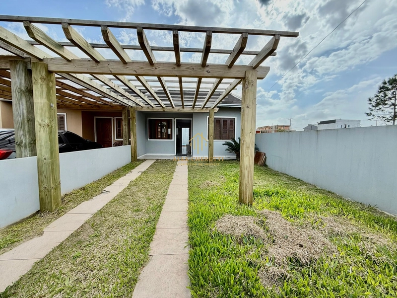 Casa geminada com piscina em Atlântida Sul: 2ª foto da galeria de imagens do imóvel