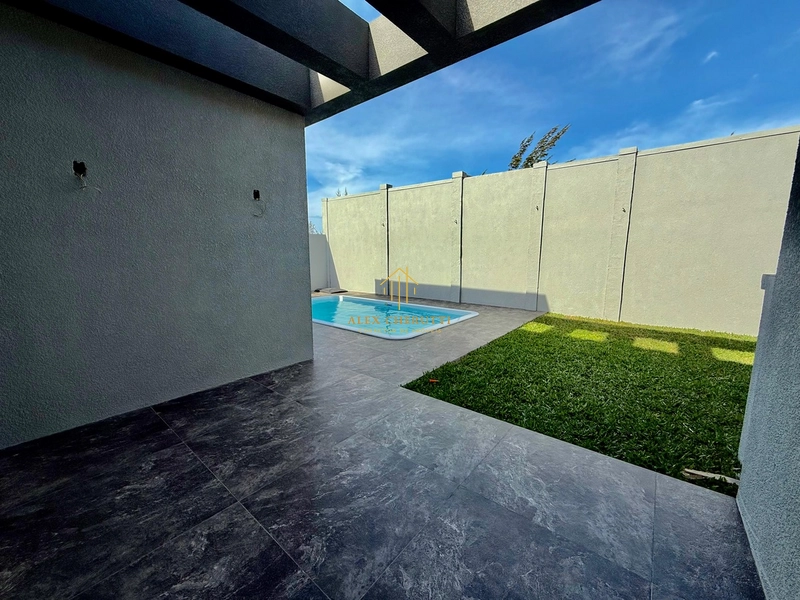 Casa nova na praia de Atlântida Sul: 18ª foto da galeria de imagens do imóvel