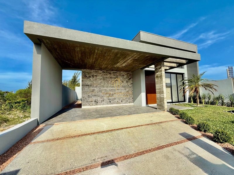 Casa nova na praia de Atlântida Sul: 2ª foto da galeria de imagens do imóvel