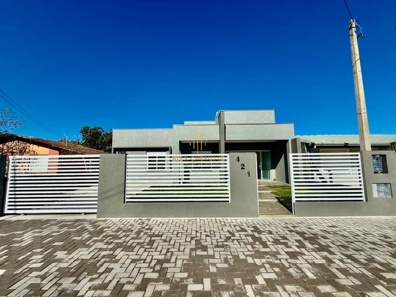 Casa na praia de Atlântida Sul, 3 dormitórios: 2ª foto da galeria de imagens do imóvel