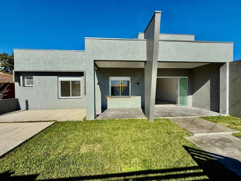 Casa na praia de Atlântida Sul, 3 dormitórios: 1ª foto da galeria de imagens do imóvel