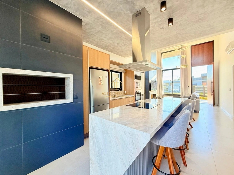 Linda casa na praia de Atlântida Sul, 3 dormitórios: 7ª foto da galeria de imagens do imóvel