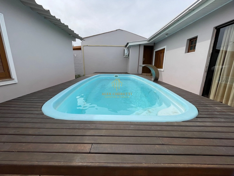 Casa com espaço gourmet e piscina na praia de Atlântida Sul: 13ª foto da galeria de imagens do imóvel