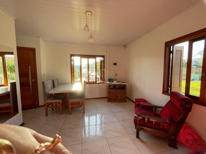 Casa com espaço gourmet e piscina na praia de Atlântida Sul: 4ª foto da galeria de imagens do imóvel