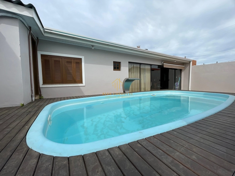 Casa com espaço gourmet e piscina na praia de Atlântida Sul: 12ª foto da galeria de imagens do imóvel