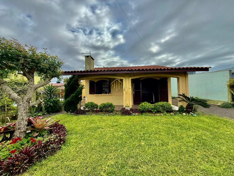 Casa na praia de Atlântida Sul, 2 dormitórios: 2ª foto da galeria de imagens do imóvel