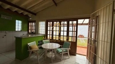 Casa na praia de Atlântida Sul, 3 dormitórios: 3ª foto da galeria de imagens do imóvel