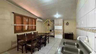 Casa na praia de Atlântida Sul, 3 dormitórios: 6ª foto da galeria de imagens do imóvel