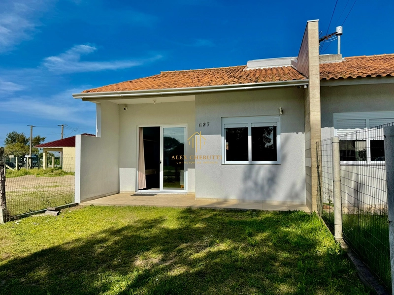 Bela casa geminada na praia de Atlântida Sul: 4ª foto da galeria de imagens do imóvel