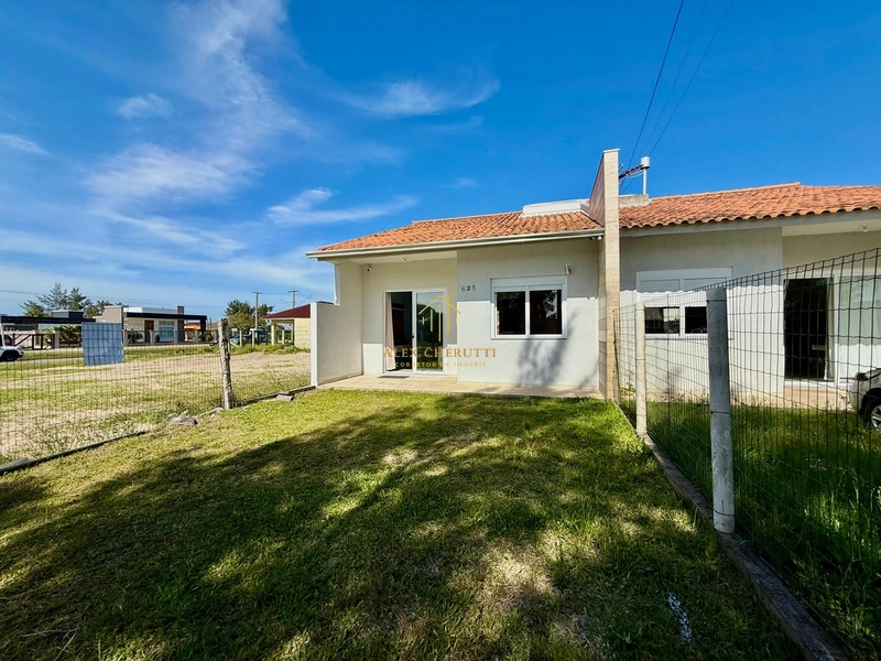 Bela casa geminada na praia de Atlântida Sul: 5ª foto da galeria de imagens do imóvel
