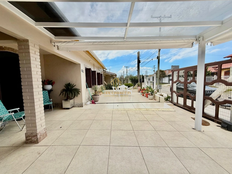 Casa na praia de Atlântida  Sul, 4 dormitórios: 3ª foto da galeria de imagens do imóvel