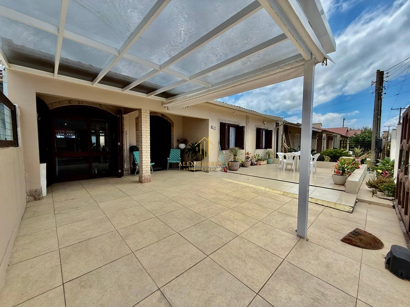 Casa na praia de Atlântida  Sul, 4 dormitórios: 2ª foto da galeria de imagens do imóvel