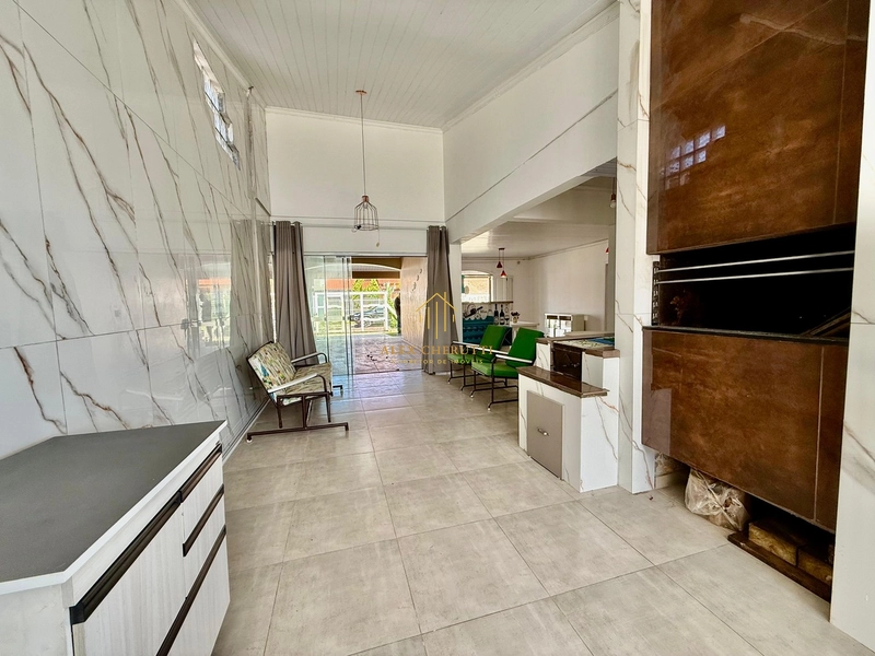 C ela casa na praia de Atlântida Sul, próximo ao mar: 10ª foto da galeria de imagens do imóvel