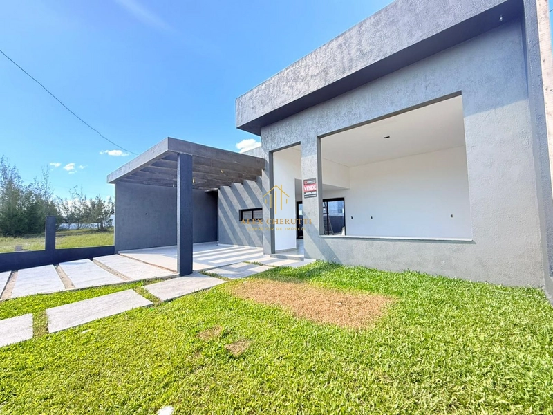 Bela casa à venda na praia de Atlântida Sul: 3ª foto da galeria de imagens do imóvel