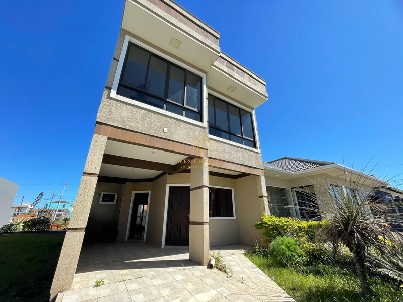 Sobrado à venda  na praia de Atlântida Sul, 4 dormitórios: 2ª foto da galeria de imagens do imóvel