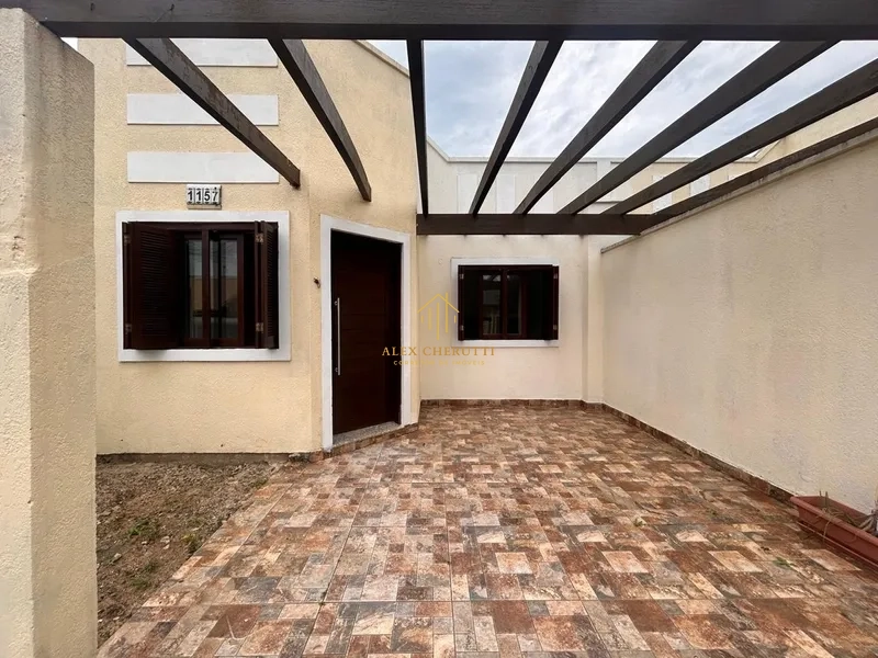 Casa geminada  à vnda na praia de Atlântida Sul, 2 dormitórios