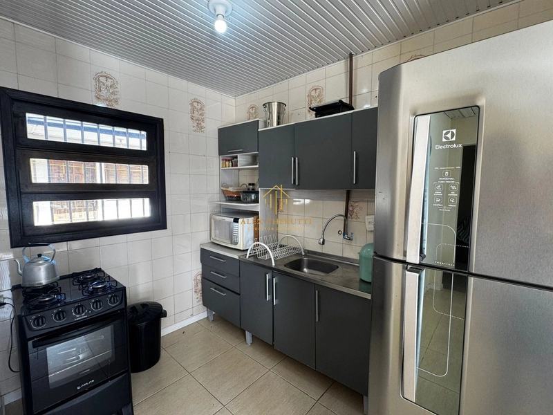 Casa à venda em Atlântida Sul, 4 dormitórios: 8ª foto da galeria de imagens do imóvel