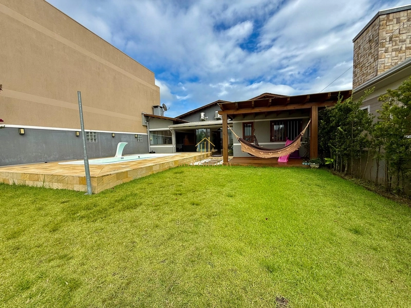 Casa na Praia de Atlântida Sul, 3 dormitórios: 3ª foto da galeria de imagens do imóvel