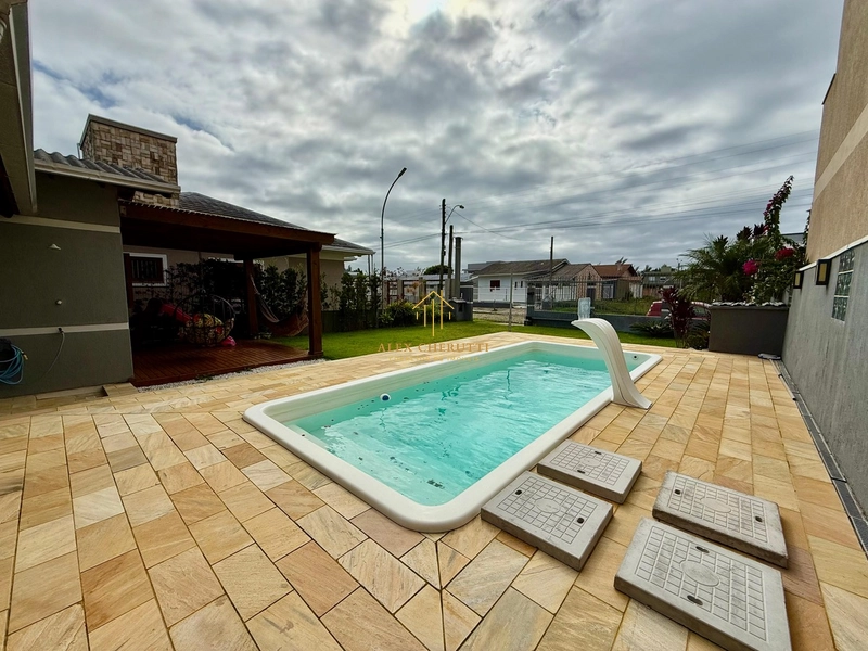 Casa na Praia de Atlântida Sul, 3 dormitórios: 5ª foto da galeria de imagens do imóvel