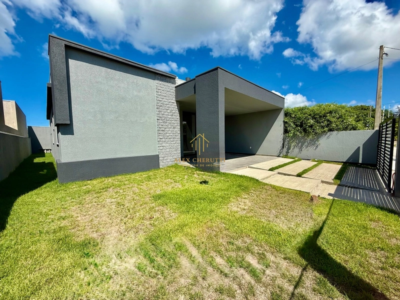 Casa na Praia de Atlântida Sul, 3 dormitórios: 2ª foto da galeria de imagens do imóvel