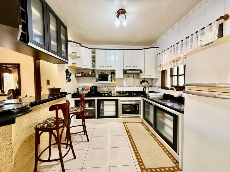 Bela casa  à venda na praia de Atlântida Sul, 3 dormitórios: 10ª foto da galeria de imagens do imóvel