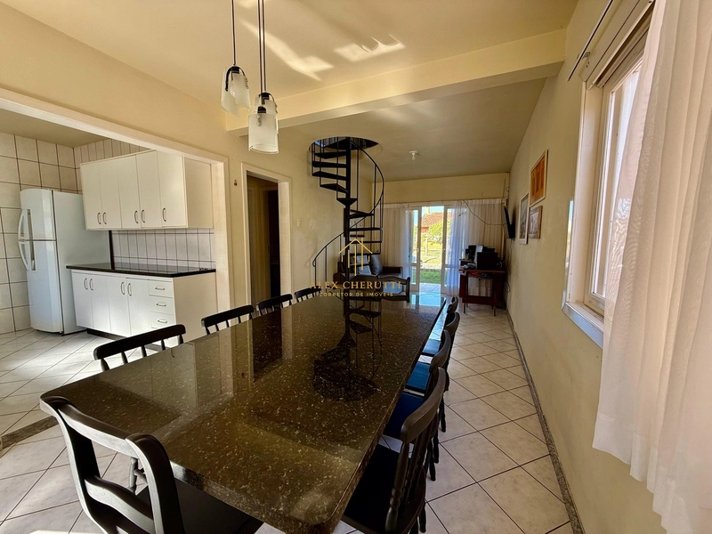 Belo sobrado à venda na praia de Atlântida Sul, 5 dormitórios: 10ª foto da galeria de imagens do imóvel