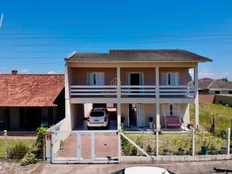 Belo sobrado à venda na praia de Atlântida Sul, 5 dormitórios: 1ª foto da galeria de imagens do imóvel