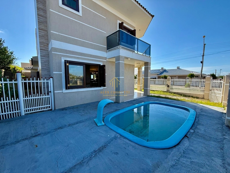 Lindo sobrado à venda em Atlântida Sul, 4 dormitrios: 3ª foto da galeria de imagens do imóvel