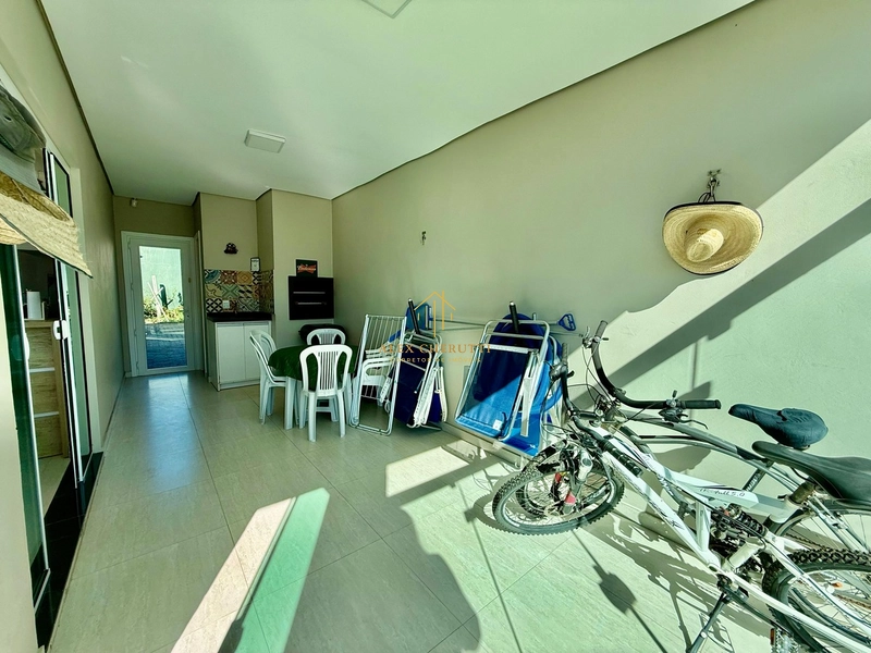 Bela casa à venda na praia de Atlântida Sul, 4 dormitórios: 5ª foto da galeria de imagens do imóvel