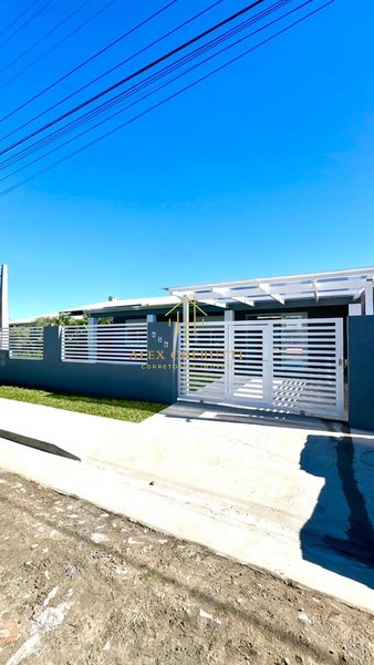 Casa à venda na praia de Atlântida Sul, 3 dormitórios: 3ª foto da galeria de imagens do imóvel