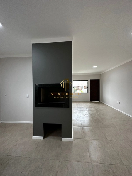 Casa geminada no centro de Xangri-lá: 6ª foto da galeria de imagens do imóvel