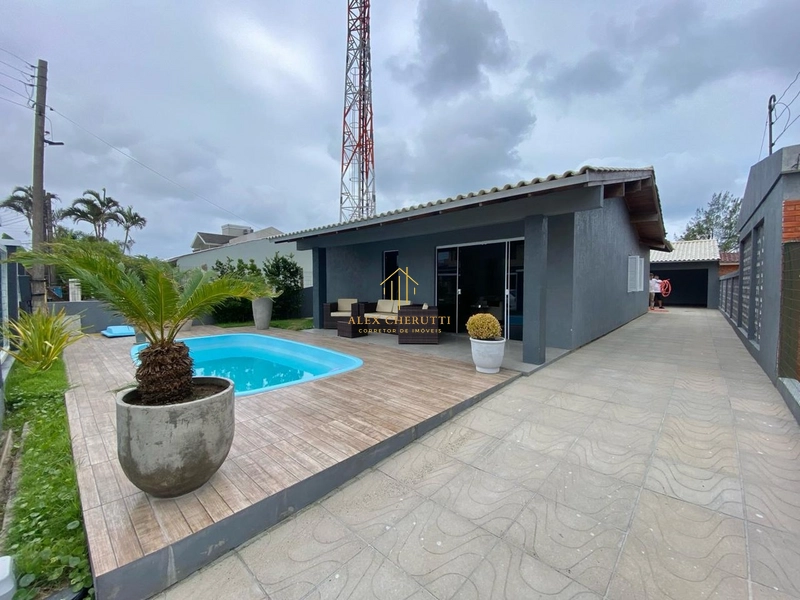 Casa no Centro em Xangri-Lá, 4 dormitórios: 2ª foto da galeria de imagens do imóvel