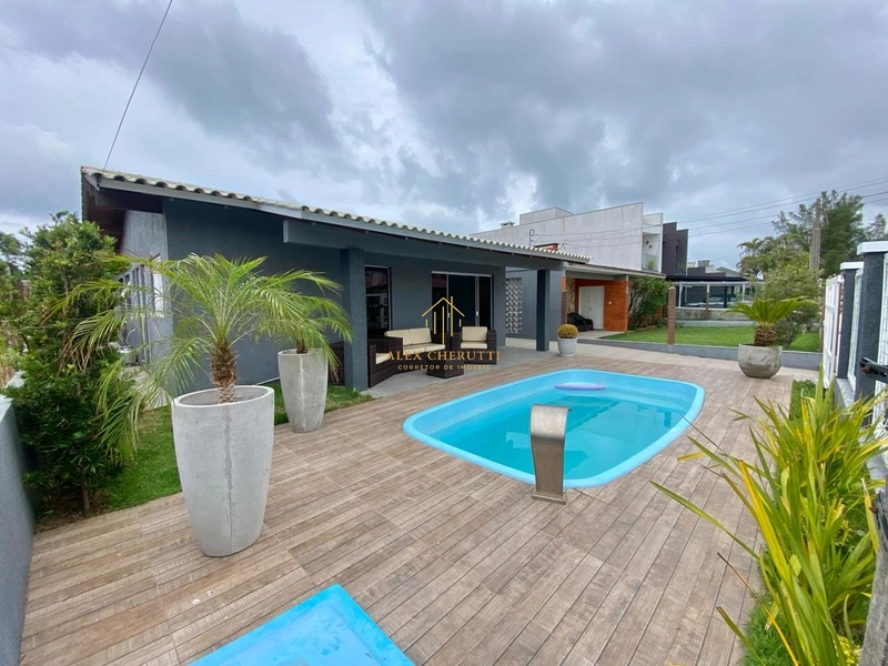 Casa no Centro em Xangri-Lá, 4 dormitórios: 1ª foto da galeria de imagens do imóvel