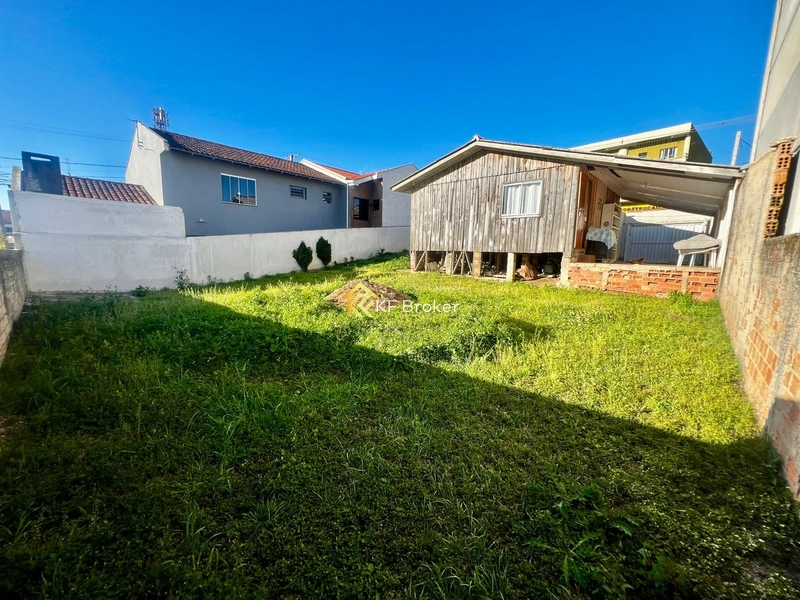 Terreno com Casa de Madeira e Contêiner Comercial – Campo Pequeno: 1ª foto da galeria de imagens do imóvel