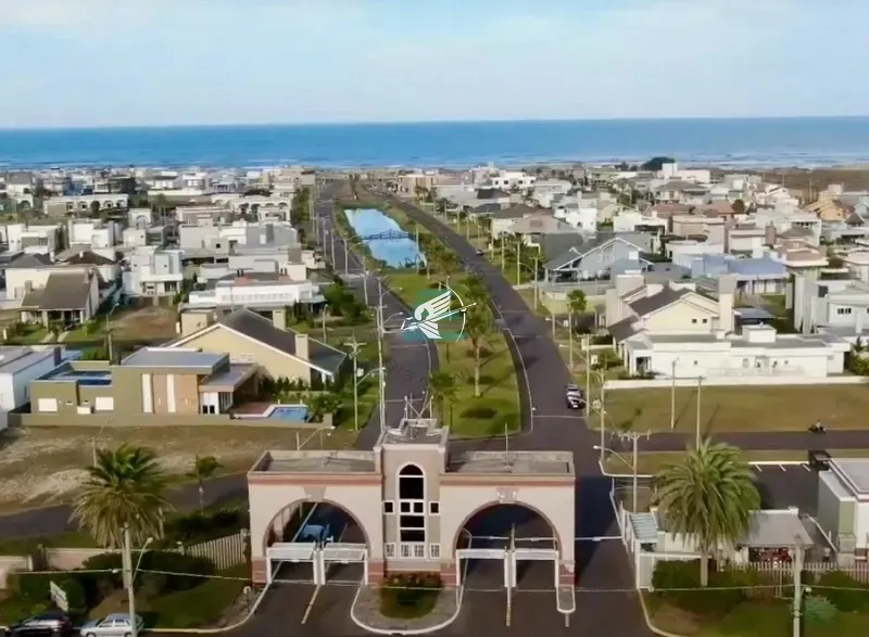Terreno á venda no Condomínio Atlantico Villas Club: 1ª foto da galeria de imagens do imóvel