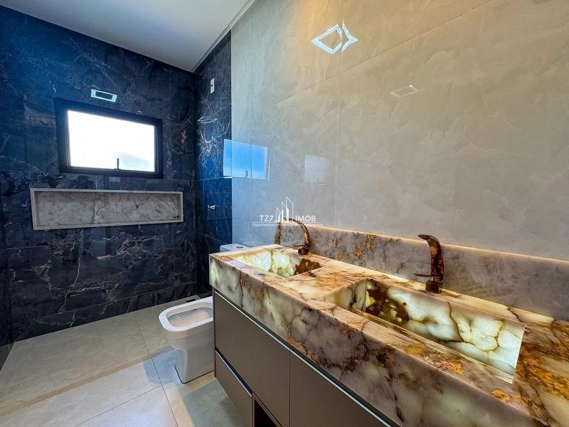 Casa Subtérrea com 4 suítes plenas, incluindo uma master com armários.: 15ª foto da galeria de imagens do imóvel