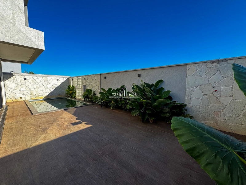 Sobrado com 4 suítes plenas no Jardins Bolonha, armários na sala.: 14ª foto da galeria de imagens do imóvel