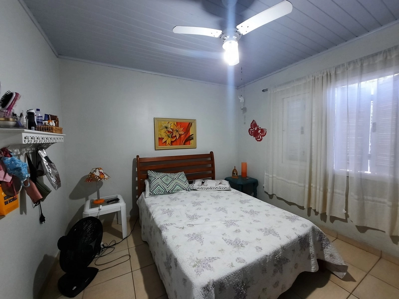 Casa no centro de CAPÃO NOVO: 7ª foto da galeria de imagens do imóvel